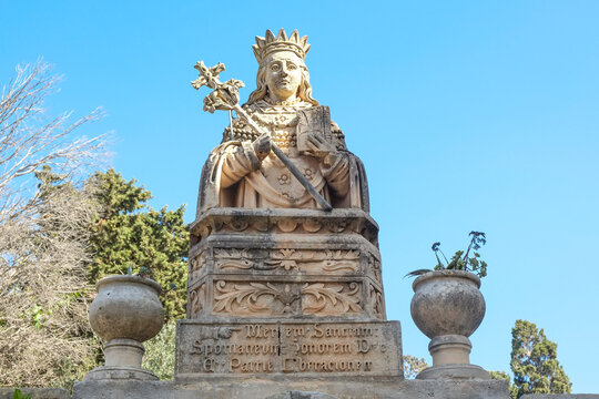 Malta. Old city of Rabat, Old stone statue figure with the cross of Malta