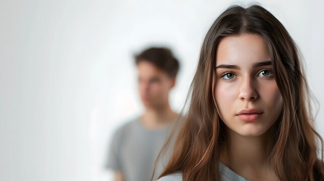 Professional Portrait of Young Woman Showing Skepticism with Boyfriend in Background