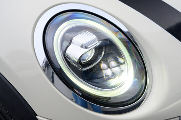 A close up of a car's headlight