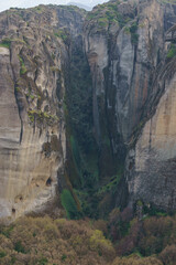 Detail view of landscape of the famous rock formations of Meteora with green grass at spring time, Kalambaka, Thessaly, Greece