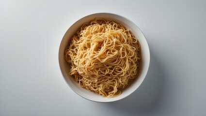 Instant noodles cooked in a bowl on a white background, isolated fried noodles.