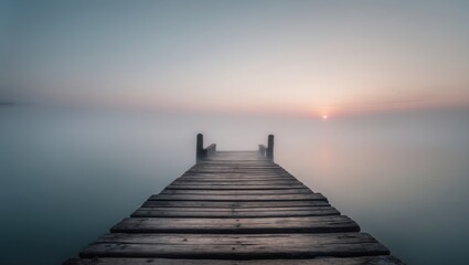 Fototapeta premium Sunset captured with a long exposure over a wooden bridge
