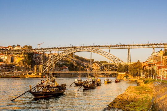 Rabelo boats near the Luis I Bridge over the Douro River, Porto, Portugal.