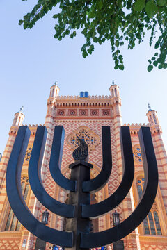 Romania, Bucharest. Choral Temple, Copy of Vienna's Great Synagogue. Menorah sculpture in front.
