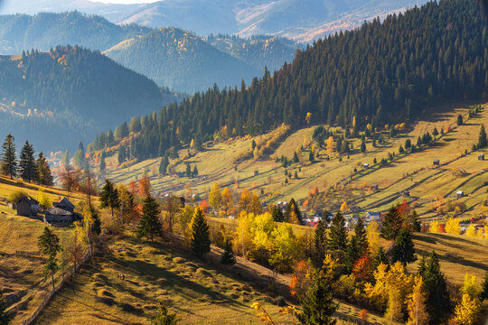 Romania, Prahova County, Bucegi Mountains, Busteni. Rural farms. Territorial view.