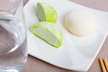 Plate with tasty Japan traditional rice cake - mochi, delicious dessert