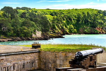 Colorful cannon Dartmouth Castle, Kingswear, Devon, England. Castle originally built 1300's.