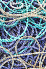 Amble, Morpeth, Northumberland, England. Purple and green ropes on the docks of Amble.