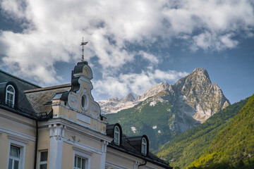 Slovenia, Bovec. House with Julian Alps in background.