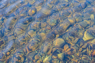 Greenland, Kangerlussuaq. Stones at the bottom of clear pons.