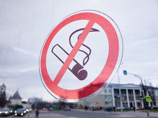 NO SMOKING sign symbol, no smoking on glass, window. Non-smoking area, this area is not intended for smoking.