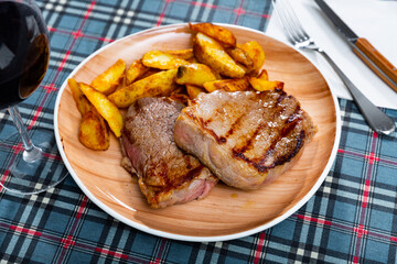 Portion of potatoes with veal steak, popular dish of eastern Europe