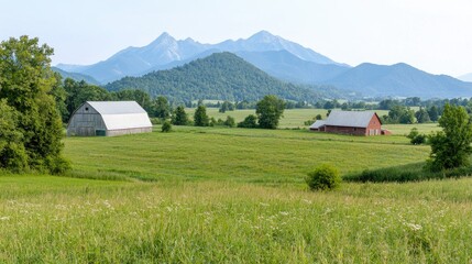 Serene landscape rolling green field with distant mountains