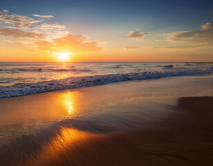 Obraz premium The golden sun sets gently over the calm ocean, casting warm reflections on the wet sand and creating a peaceful, breathtaking summer evening by the sea.