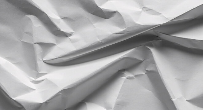 Crumpled Paper Texture: Abstract close-up of heavily textured paper, capturing the intricate folds and shadows, creating a visually captivating and tactile experience.