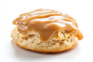 Delicious buttery biscuit topped with sweet caramel drizzle on a pristine white background ready to eat