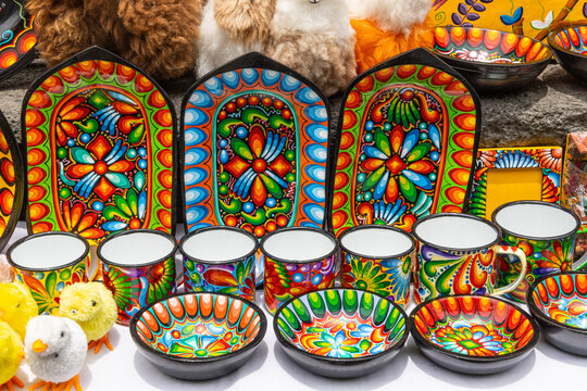 Colorful dishes, and stuffed ducks were on sale on the walls of the Basilica of Quito.