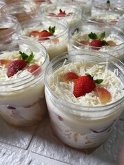 Refreshing fruit salads and rich tiramisu served in clear jars