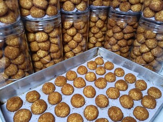 Golden palm sugar cookies freshly baked and packed in jars