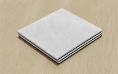 Fototapeta premium Folded Light Gray Fabric Mockup on Wood Table