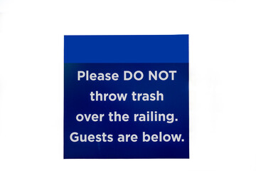 sign please do not throw trash over the railing guests are below