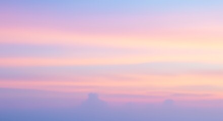 Fototapeta premium Pastel Sky: Soft Hues of Sunrise or Sunset