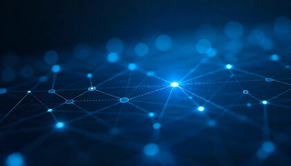 Obraz premium A glowing blue network with interconnected nodes and lines on a dark blue gradient background