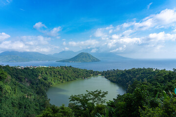 View of Ngade Lake on Ternate Island, North Maluku Province, Indonesia. We can see Maitara Island and Tidore Island in the background