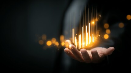 Golden bar graph appears in a businessman's open hand.