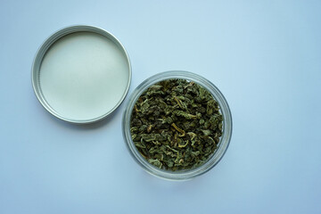Dried Loose Leaf Tea in Glass Jar with Lid Top View