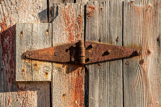 USA, Vermont, Newbury. Connecticut River Valley, weathered barn with peeling red paint.