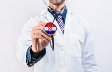 Croatia healthcare system, doctor holding stethoscope. Croatia health and medical insurance concept