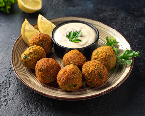 Baked falafel with tahini sauce