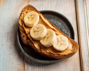 Banana and peanut butter on whole grain toast