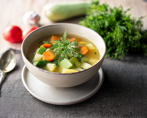 Light vegetable soup with fresh herbs