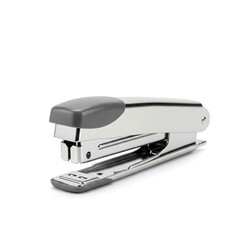 Red plastic stapler isolated on white background with soft shadow for modern office setup
