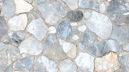 A textured surface of variously shaped blue and gray stones arranged closely together, showcasing natural patterns and colors.