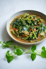 Stir fry Pepperomia pellucida herb in a plate 