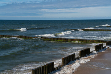 View of the Baltic Sea and wooden breakwaters of the city beach on a summer day, Svetlogorsk, Kaliningrad region, Russia