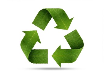 A green recycle symbol made of grass on a white background representing sustainability and environment