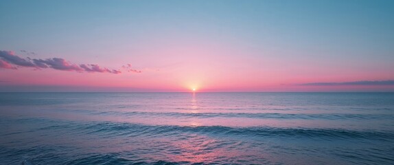 Fototapeta premium Serene Pink And Blue Coastal Sunset Over Calm Ocean