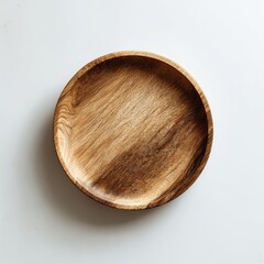 One wooden plate on white background. Tableware