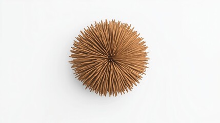 A decorative spherical object made of thin wooden sticks arranged radially, creating a textured, organic appearance.