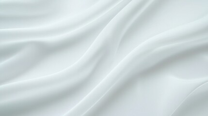 A smooth, flowing white fabric creates gentle waves, showcasing its soft texture and elegant appearance.
