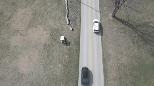 Golf cart in grass field