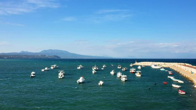 The port and fishing boats of Koroni in Europe, Greece, Peloponnese, Mani, in summer, on a sunny day.&nbsp;