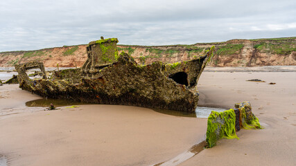 Stones on the beach and the ST Pasages Shipwreck between Ballasalla and Sartfield, Isle of Man