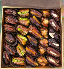 Mixed dates filled with pistachio, almonds, peanut butter, orange