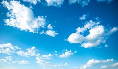 Fototapeta premium Clear Blue Sky with Soft White Clouds on a Sunny Day