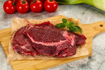 Raw beef cheeks cut for cooking